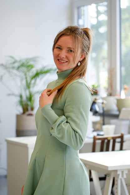 Nachhaltiges Winterkleid in hellem Grünton